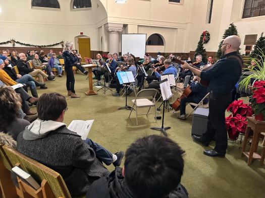 Finger Lakes Fiddle Orchestra Concert December 2024 with people playing stringed instruments